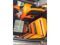 luxury-mercedes-benz-g-class-suv-vibrant-orange-interior-spacious-cargo-space-small-4