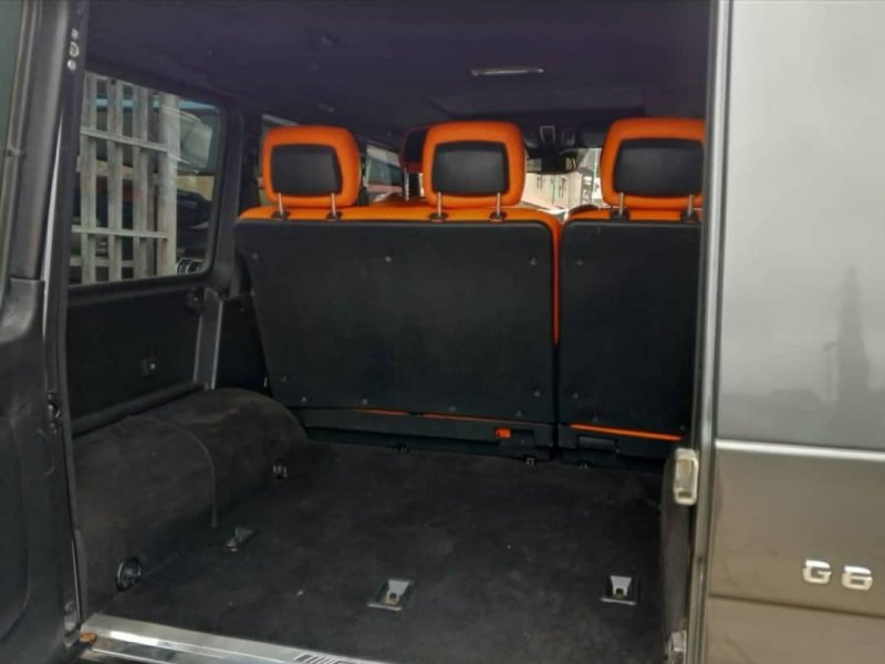 luxury-mercedes-benz-g-class-suv-vibrant-orange-interior-spacious-cargo-space-small-1